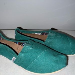 Tom’s green, canvas women’s shoes; size 6.5